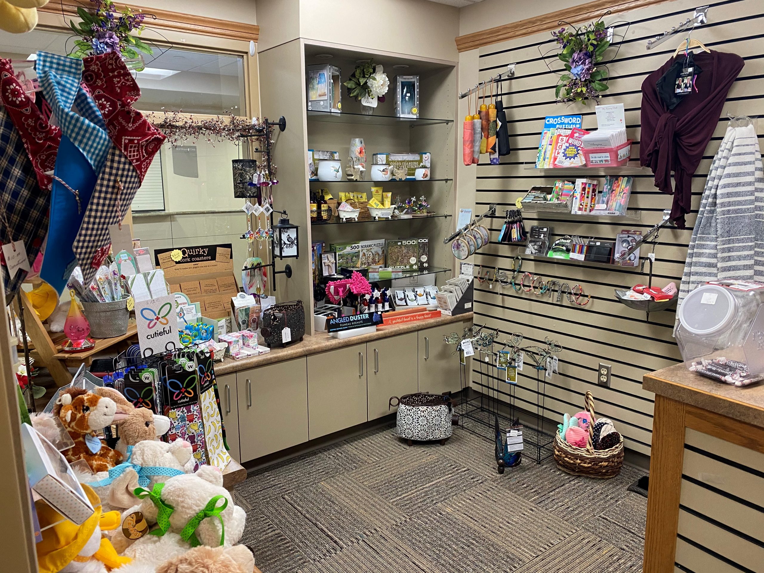 The interior of the Just Because Gift Shop shows items for sale.