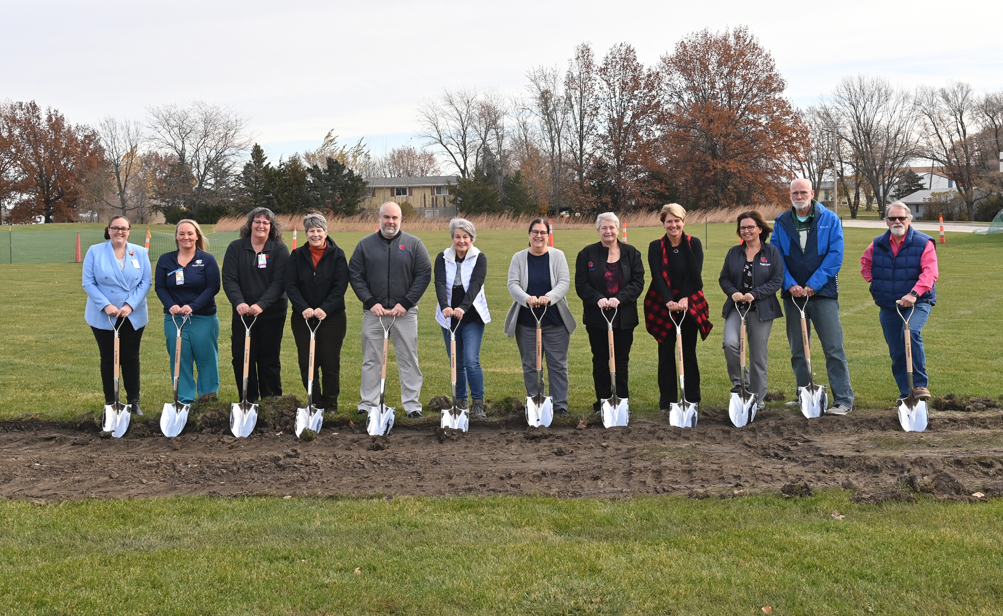 Members of the DCH Board of Trustees, and DCH staff members gather to break ground on the new DCH Outpatient Specialty Clinic.